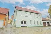 Hausansicht / Straßenseite - interessantes Zweifamilienhaus in Jessen Elster - EG auch als Gewerbe nutzbar