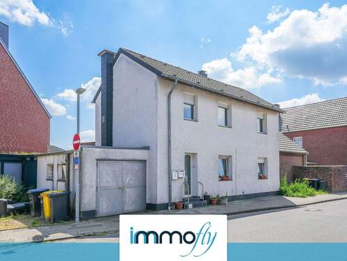 Hausansicht mit Maske - Familienfreundliches Einfamilienhaus in Erkelenz-Hetzerath - 116?m², viel Platz & Potenzial