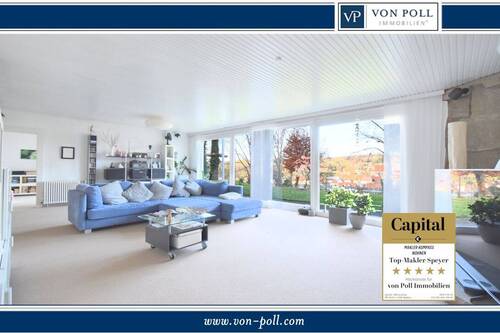 Titelbild - Großzügiger Bungalow mit weitläufigem Grundstück, Garage und Carport