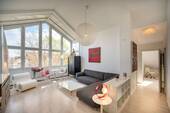 Wohnzimmer - KENSINGTON - Exklusiv - Lichtdurchflutete Dachgeschosswohnung mit beeindruckender Fensterfront