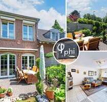 PHI KÖLN - Gepflegtes Reihenhaus mit zwei Tiefgaragenplätzen im beliebten Pulheim-Brauweiler!