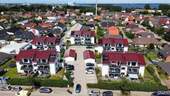 Luftaufnahme - Moderne und ruhig gelegene 4-Raumwohnung im Stralsunder Stadtteil 'Andershof'