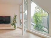 Wohnzimmer mit Balkon - 