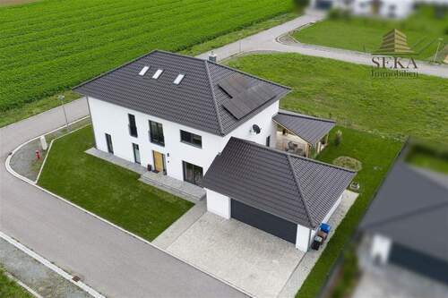 Außenansicht - Zeitlos elegantes Einfamilienhaus mit Panoramablick und Garten - Effizienzhaus 40 Plus