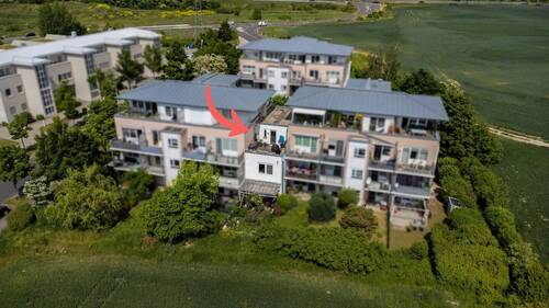 Gebäudeansicht - RUHIG WOHNEN, STADTNAH LEBEN Reihenhaus mit Garten, Dachterrasse und TG-Stellplatz