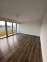 Wohnzimmer - Waldsassen! Sanierte 3-Zimmer-Wohnung mit Balkon WE12