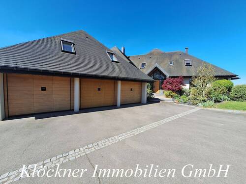 Frontansicht + Garagenhaus - 