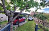 Carport mit weiterem Stellplatz - 2 Zimmer Einfamilienhaus zum Kaufen in Wiesengrund