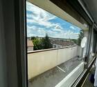 Ausblick Wohnzimmer.jpeg - 2 Zimmer mit Balkon über den Dächern von Lauf