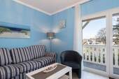 Das gepflegte Wohnzimmer mit Balkon - 