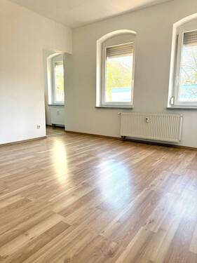 Wohnbereich mit Blick in die Küche - Etagenwohnung mit 40,00 m&sup2; in Fürth zur Miete