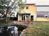 Garten/Teich und Nebeneingang - Halle in Breisach zur Miete
