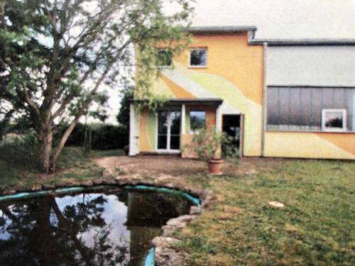 Garten/Teich und Nebeneingang - Halle in Breisach zur Miete