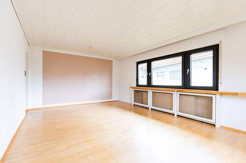 Wohnzimmer Whg. EG_Ansicht 2 - Mehrfamilienhaus, Wohnhaus mit 229,00 m² in Bischofsheim zum Kaufen