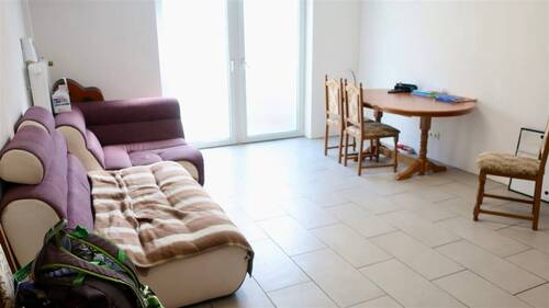 Wohnzimmer Souterrain mit Ausgang Terrasse - 