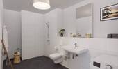 Modern gefliestes Bad mit bodengleicher Dusche - 3 Zimmer Etagenwohnung zum Kaufen in Köln-Weidenpesch