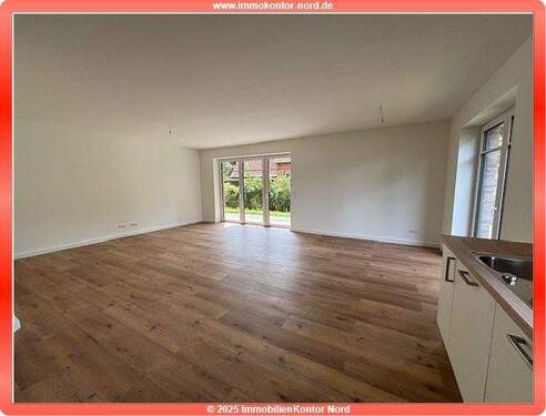 Wohnen-Essen-Küche - stilvoller NEUBAU im EG mit Terrasse, EBK, Carport + Keller