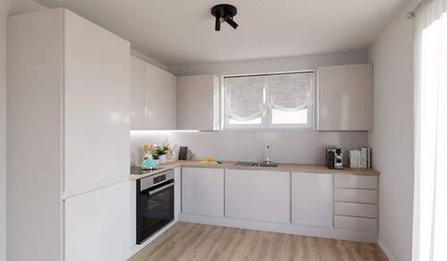 Die offene Wohnküche lädt zum gemeinsamen Kochen e - 