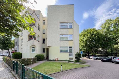 Außenansicht - 2 Zimmer, Balkon ins Grüne und eigener Stellplatz - hier entsteht Ihr neues Zuhause
