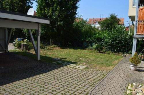 Carport mit Gemeinschaftsfläche Gartenbereich - 