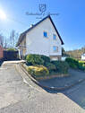 Hausansicht mit Garage - Mehrfamilienhaus, Wohnhaus mit 155,00 m&sup2; in Saarbrücken / Klarenthal zum Kaufen