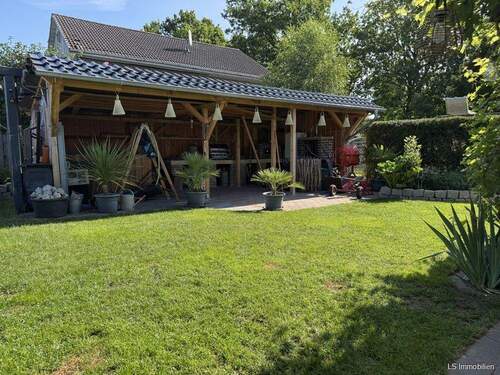 Gartenhaus - Einfamilienhaus mit 217,00 m&sup2; in Wiefelstede / Ofenerfeld zum Kaufen
