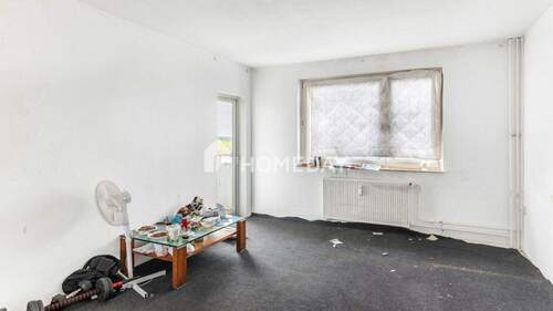 Wohnzimmer 1 - 4 Zimmer Etagenwohnung zum Kaufen in Wolfsburg