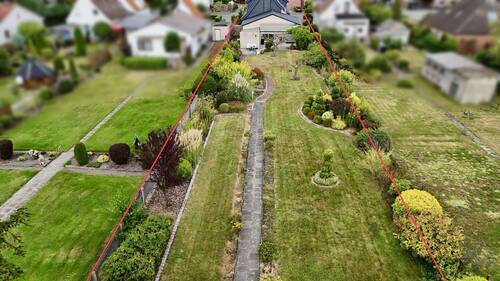 Garten - 9 Zimmer Einfamilienhaus zum Kaufen in Ganderkesee