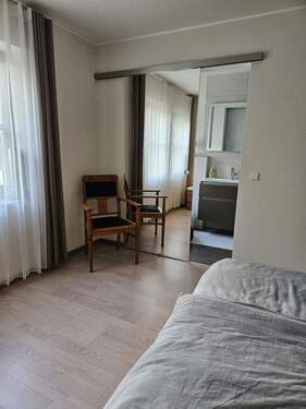 Schlafzimmer/ Bad en suite - 