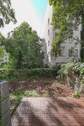 Blick von der Terrasse in den privaten Garten - 3 Zimmer Etagenwohnung in Berlin