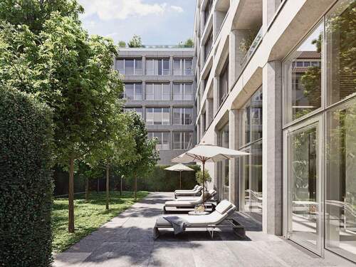SUITES AM TACHELES Ruhebereich Innenhof.jpeg - 