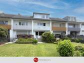 H&T Immobilien - Reihenhaus in Stuhr - Charmantes Reihenmittelhaus mit Garage und gepflegtem Garten