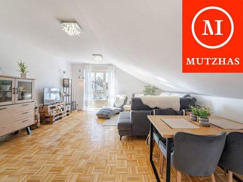 Wohn- und Esszimmer - MUTZHAS - Dachgeschosswohnung mit fast 140 Qm Gartenanteil