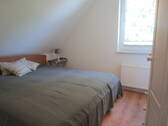 226. Zweites Schlafzimmer im OG.des Hauses.JPG - 