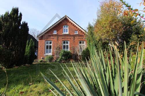 Frontansicht - Charmantes renovierungsbedürftiges Fehnhaus in ruhiger Sackgasse - Ihr kreatives Paradies in Weener