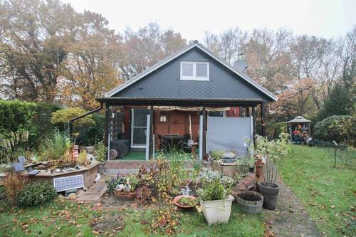 Vorderansicht 2 - Eigenheim mit ca. 72,92 m² wohnlich nutzbarer Fläche, Garten und Stellplatz in ruhiger Randlage