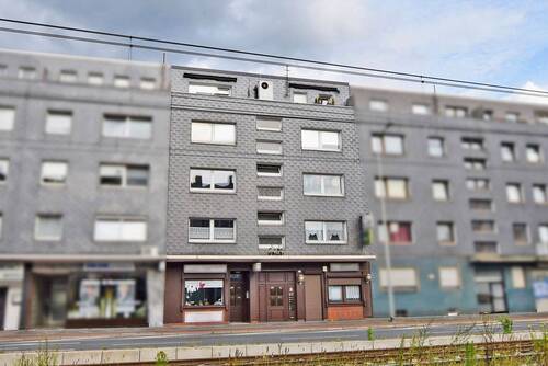 Ansicht - Gepflegtes Wohn- und Geschäftshaus, Wanheimerort