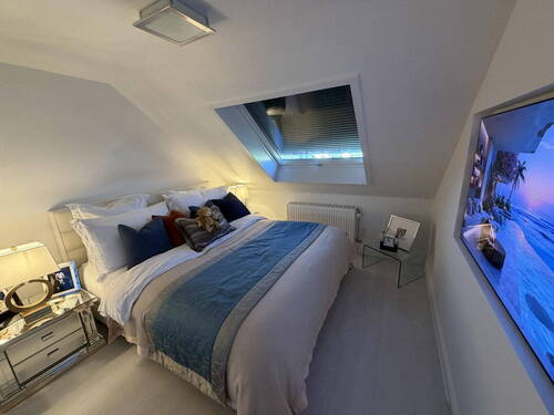 Schlafzimmer DG - 4 Zimmer Etagenwohnung in München