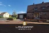 Charmante Doppelhaushälfte mit Potenzial auf tollem Endgrundstück mit Keller und Carport! - Dünsen