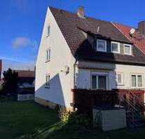 Charmante Doppelhaushälfte mit großem Potenzial und idyllischem Grundstück in Niestetal