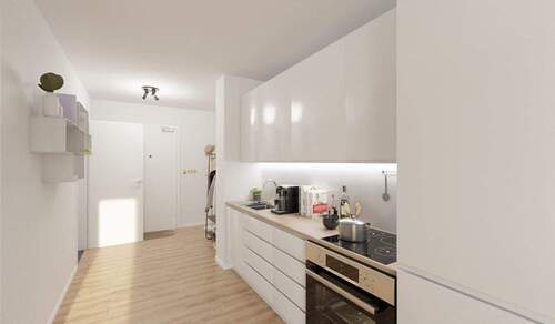 Die offene Wohnküche lädt zum gemeinsamen Kochen ein - 1 Zimmer Etagenwohnung zum Kaufen in Langen