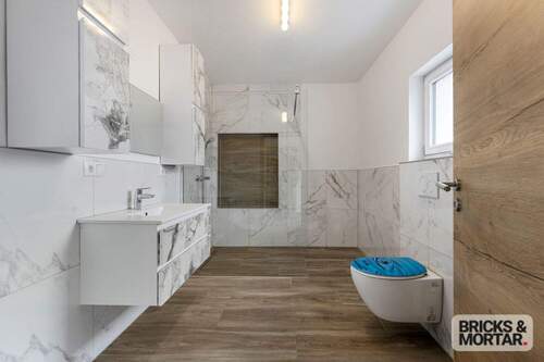 Badezimmer Erdgeschoss - Einfamilienhaus mit 185,20 m² in Blindheim / Unterglauheim zum Kaufen