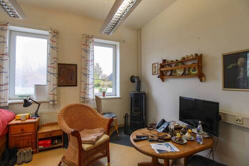 Zimmer mit Kaminofen - 