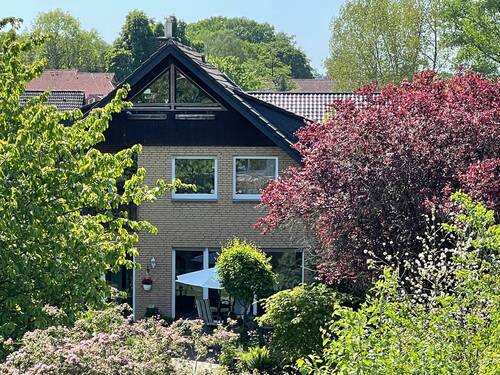 Gartenansicht - Zweifamilienhaus in Hellern am See