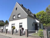 Bild 1 - PURNHAGEN-IMMOBILIEN - Freistehendes 1-Fam.-Haus mit Garage in ruhiger und grüner Wohnlage!