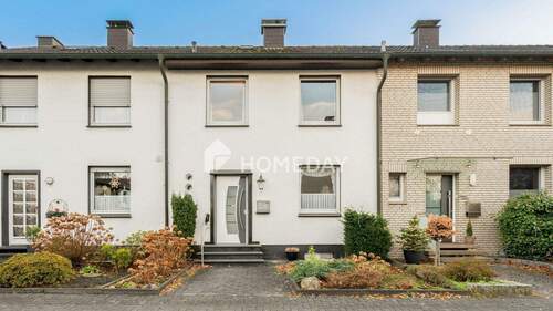 Außenansicht 2 - Gepflegtes Reihenhaus mit Ausbaupotenzial und sonnigen Außenbereichen