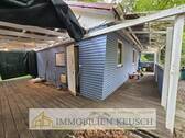 Überdachte Terrassen ums Haus - 