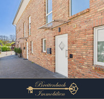 Norderstedt-Harksheide . Bezauberndes Reihenmittelhaus mit separatem Garten & Stellplatz