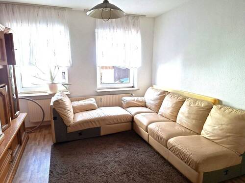 Teilansicht Wohnzimmer - 3 Zimmer Etagenwohnung in Hilders