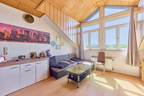 Wohnzimmer_DG - 8 Zimmer Mehrfamilienhaus, Wohnhaus in Wald-Michelbach